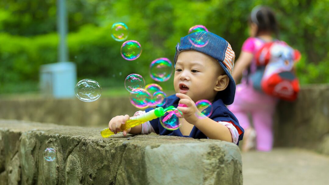 toddler with bubbles